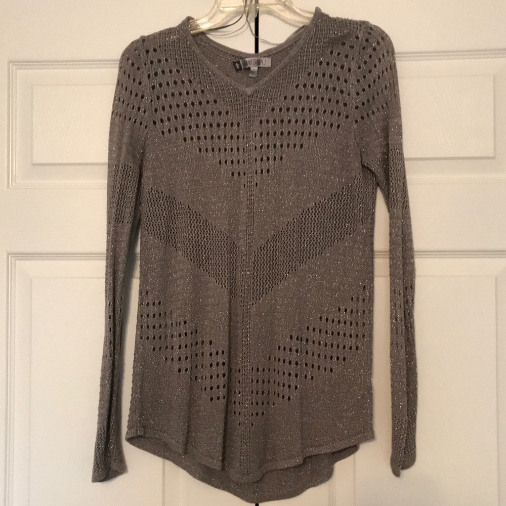 Grey Jennifer Lopez sweater with sparkles